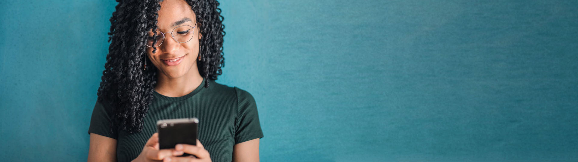 Beautiful Girl Messaging on Cellphone - Representing Terms of Use